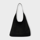 Brown Isabella minimalist slouch handbag with soft structure from Lumina Wear, featuring a casual, relaxed design and subtle branding.