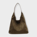 Brown Isabella Lumina minimalist slouch handbag with soft structure, featuring a relaxed design and subtle branding.