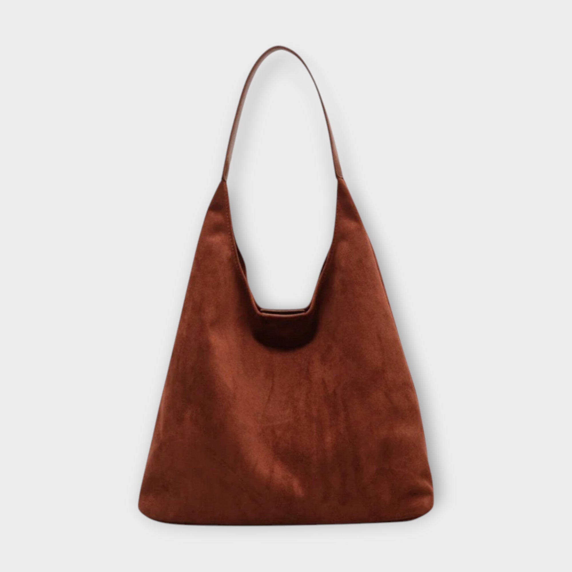 Brown Isabella minimalist slouch handbag with soft structure from Lumina Wear, showcasing a relaxed, stylish design and natural leather texture.