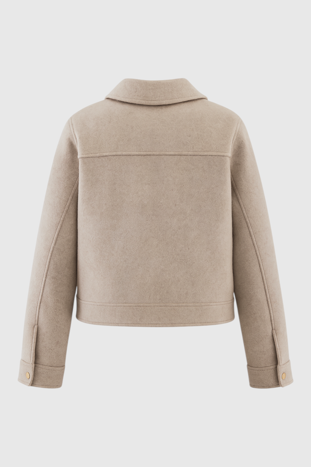 Beige Isabella Lumina Wear modern cropped zip-up jacket with pockets, shown on a model.