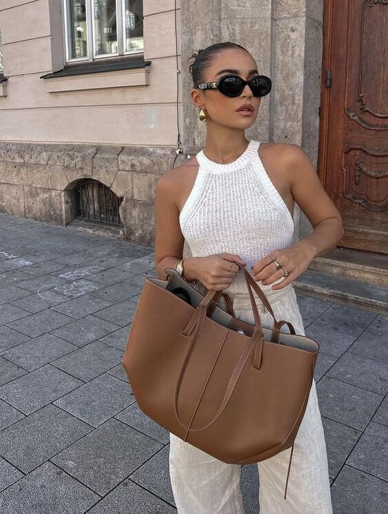 Brown Isabella oversized vintage handbag by Lumina Wear with versatile straps, featuring a spacious interior and stylish design.