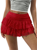 White ruffled mini skirt with a wide waistband from Lumina Wear, designed for a playful and stylish look.