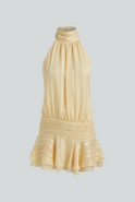 Yellow mini dress from Lumina Wear featuring a playful design and feminine fit, shown on a model.