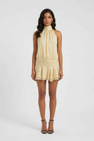 Isabella yellow mini dress by Lumina Wear, casual dress with feminine fit and playful style, shown on a model.