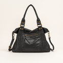 Black Lumina Wear Isabella retro-chic unisex backpack with spacious design and multiple compartments for school and daily use.