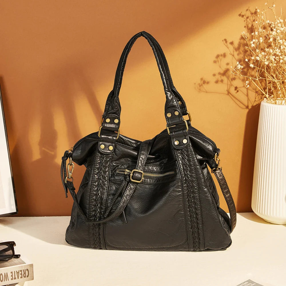 Black Isabella Retro-Chic Unisex School Bag by Lumina Wear, spacious backpack with stylish design and multiple compartments.