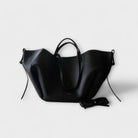 Lumina Wear Isabella sculpted minimalist tote bag in brown with spacious design, measuring 32cm x 13cm x 22cm, stylish and functional.