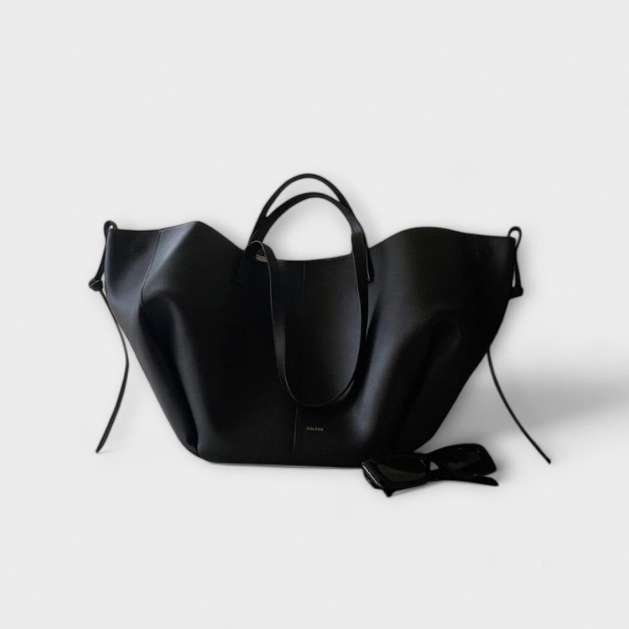 Lumina Wear Isabella sculpted minimalist tote bag in brown with spacious design, measuring 32cm x 13cm x 22cm, stylish and functional.