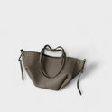Lumina Wear Isabella sculpted minimalist tote bag in brown with spacious design, measuring 32cm x 13cm x 22cm, hand-held style.