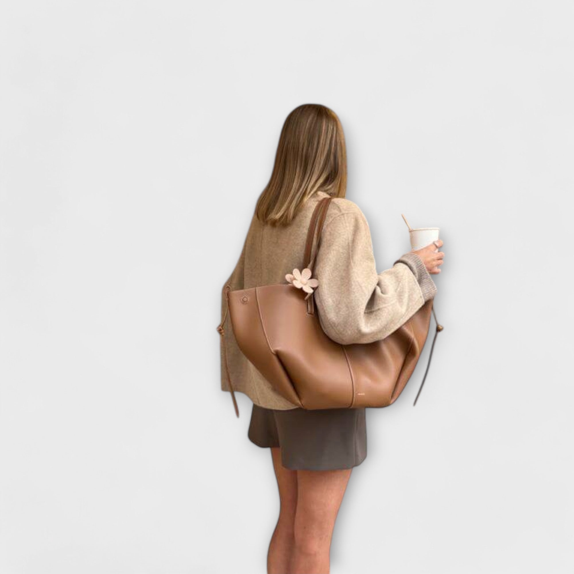 Brown Isabella sculpted minimalist tote bag by Lumina Wear, spacious design with 32cm x 13cm x 22cm dimensions, perfect for everyday use.