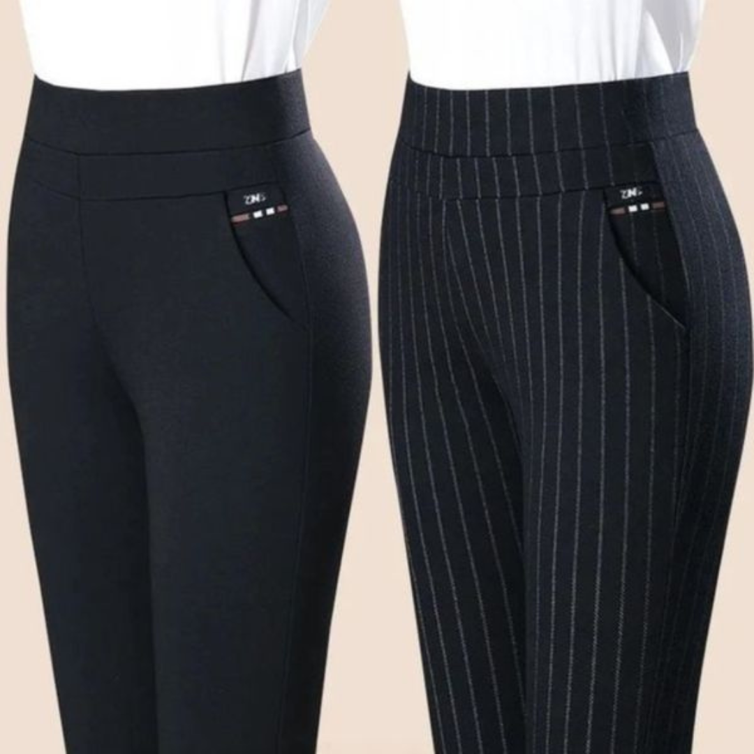Black high waist leggings with faux pockets from Lumina Wear, shown on a model, highlighting sleek fit and stylish design.