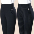 Black high waist leggings with faux pockets from Lumina Wear, shown on a model, highlighting sleek fit and stylish design.