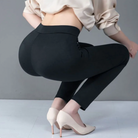 Lumina Wear Isabella black high-waist leggings with faux pockets, sleek fit, and comfortable stretch for stylish activewear.