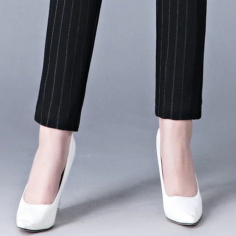 Isabella Lumina Wear high waist black leggings with faux pockets, sleek fit, and comfortable stretch fabric.