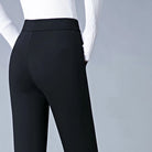 Black high waist leggings with faux pockets from Lumina Wear, featuring a sleek design and comfortable fit.