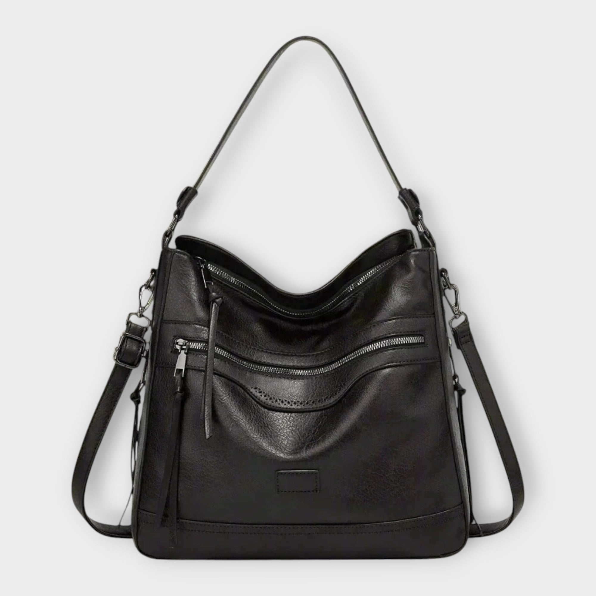 Black Isabella Lumina Wear slouchy shoulder handbag with versatile straps, featuring a spacious interior and stylish design.