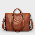 Lumina Wear Isabella soft tote bag in brown with spacious design, featuring sturdy handles and a versatile carryall style.