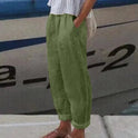 Black Lumina Wear Isabella softline trousers with side pockets, featuring a sleek, comfortable fit for casual or office wear.