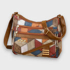Isabella textured patchwork shoulder bag by Lumina Wear with faux-leather accents, featuring a stylish design and adjustable strap.