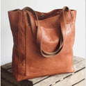 Lumina Wear Isabella brown leather shoulder handbag with spacious interior and elegant design.