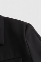 Black Isabella women's cropped jacket by Lumina Wear featuring a trendy, tailored fit and stylish design.