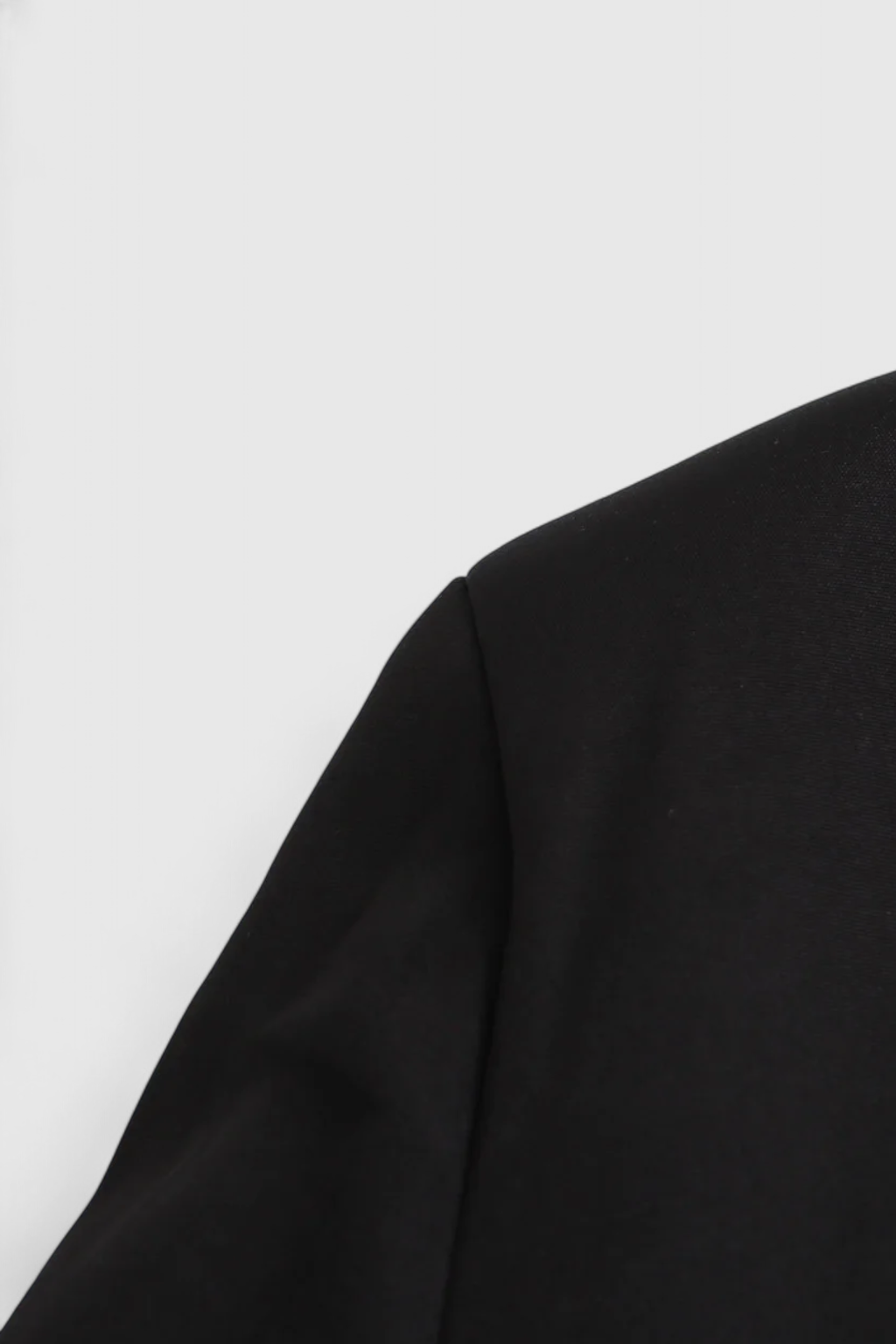 Black Isabella women's cropped jacket with tailored fit from Lumina Wear, stylish and modern outerwear for women.