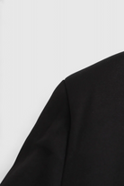 Black Isabella women's cropped jacket with tailored fit from Lumina Wear, stylish and modern outerwear for women.