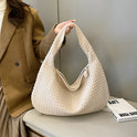 Beige Isabella Lumina Wear woven eco-leather shoulder handbag with unique design, featuring a stylish and eco-friendly look.