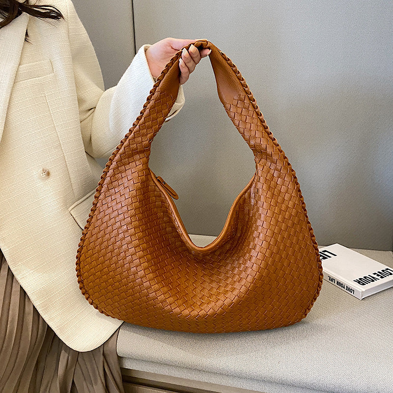 Beige Isabella woven eco-leather shoulder bag by Lumina Wear, stylish handbag with unique textured design.