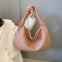 Beige Isabella Lumina woven eco-leather shoulder handbag with unique design, featuring a stylish and eco-friendly look.