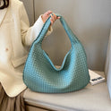 Beige Isabella Lumina woven eco-leather shoulder handbag with unique design, featuring a stylish and eco-friendly look.