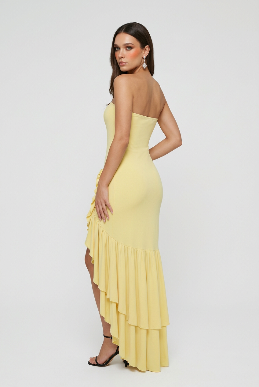 Bright yellow Isabella off-shoulder dress by Lumina Wear with ruffle details, styled for women, shown on a model.