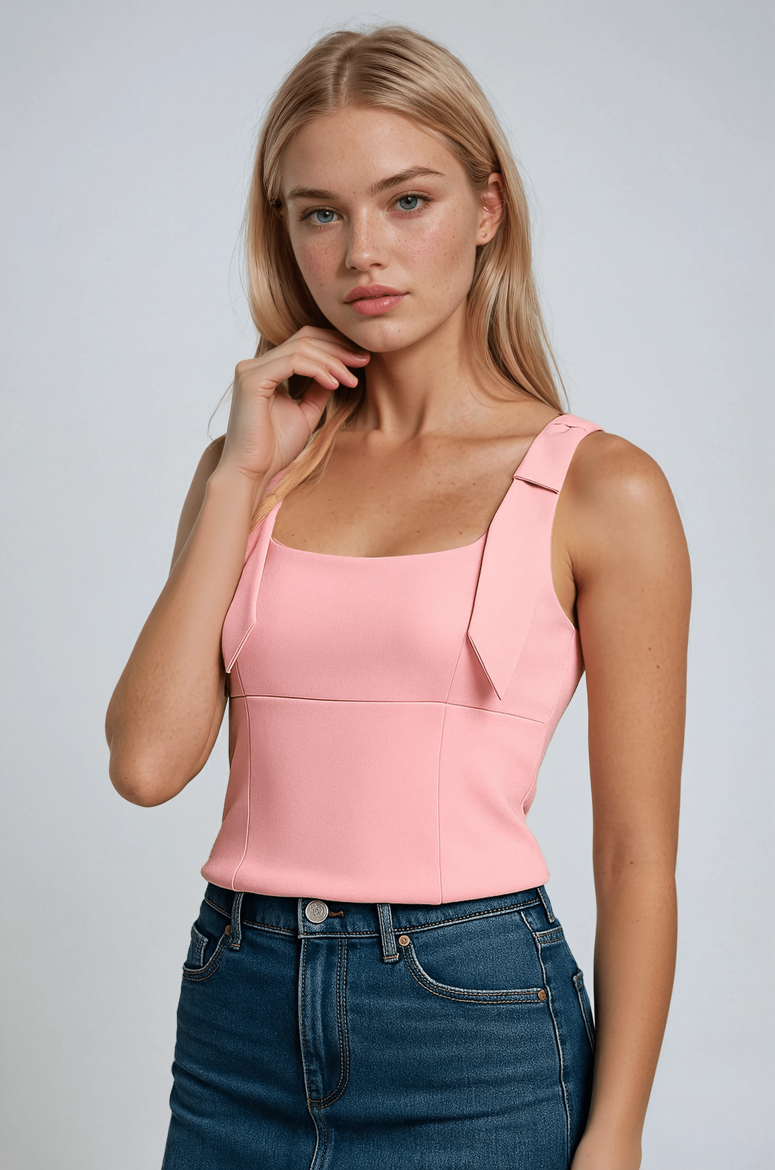 Vibrant pink Isabella cami top with playful bow detail by Lumina Wear, featuring a lightweight sleeveless design.