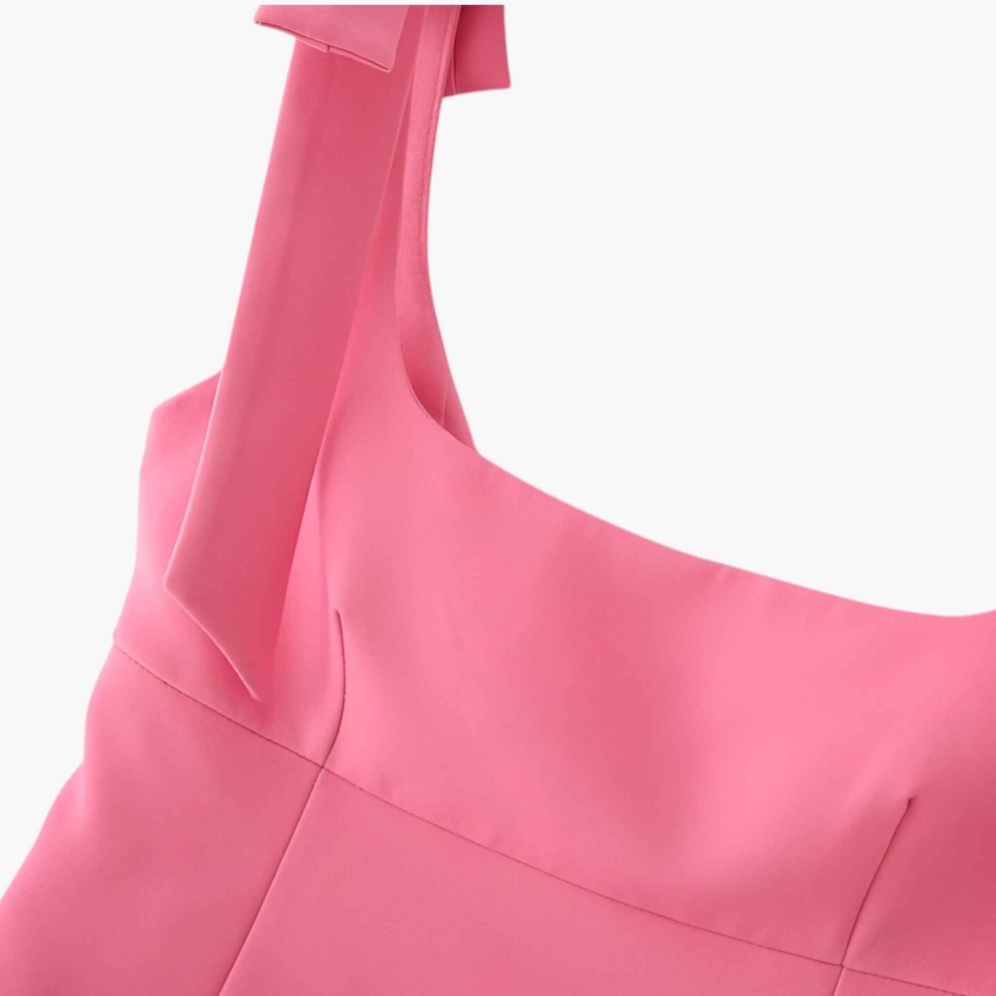 Vibrant pink Lumina Wear Isabella cami top with playful bow detail, sleeveless tank, stylish and feminine for casual wear.