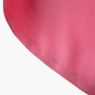 Vibrant pink Isabella cami top by Lumina Wear featuring playful bow detail, sleeveless design, perfect for casual wear.