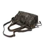Vintage-inspired black Lumina handbag with spacious design, featuring elegant handles and classic style.