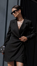 Isabelle black trench mini dress by Lumina Wear, featuring a classic trench style and fitted silhouette, shown in size S.
