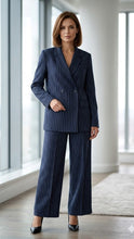 Navy blue Leandra double-breasted suit set by Lumina Wear, styled with tailored blazer and matching trousers in a modern fit.