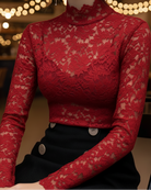 Black floral lace high neck blouse from Lumina Vancouver's Isabelle collection, featuring intricate lace detailing and a high neckline.