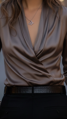 Brown lace-up blouse named Isabelle from Lumina Vancouver, shown in XS size, featuring detailed front lace-up design.