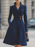 Navy blue Ottavia Tailored Fit Flared Peak Lapel Coat Dress by Lumina Wear, midi-length with structured silhouette and elegant lapel details.