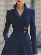 Navy blue Isabelle Tailored Fit Flared Peak Lapel Coat Dress by Lumina Vancouver, midi length, with fitted waist and elegant design.
