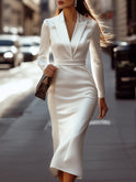 Isabelle wearing Lumina Wear's Queenie tailored white blazer dress, featuring a sleek, fitted design perfect for elegant occasions.