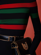 Black Vivid Stripes Turtleneck Top by Lumina Wear, casual t-shirt with colorful stripe pattern, worn by a model.