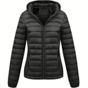 Black Isla lightweight quilted hooded puffer jacket with fleece lining by Lumina Wear, shown on a model.