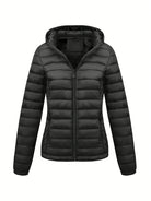 Black Isla Lumina Wear lightweight quilted hooded puffer jacket with fleece lining, shown on a model.
