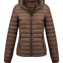 Black Isla lightweight quilted hooded puffer jacket with fleece lining from Lumina Wear, shown on a model.
