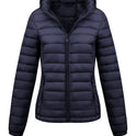 Black Isla lightweight quilted hooded puffer jacket with fleece lining from Lumina Wear, shown on a model.