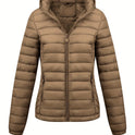 Black Isla lightweight quilted hooded puffer jacket with fleece lining by Lumina Wear, shown on a model.