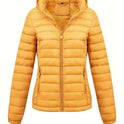 Black Isla lightweight quilted hooded puffer jacket with fleece lining by Lumina Wear, showing the padded design and hood.